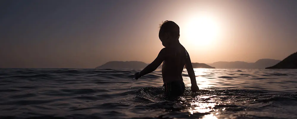 child-playing-in-lake